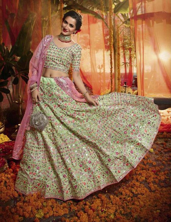Buy Enticing Pista Green Net Partywear Lehenga Choli | Buy online at Inddus  India.– Inddus.in