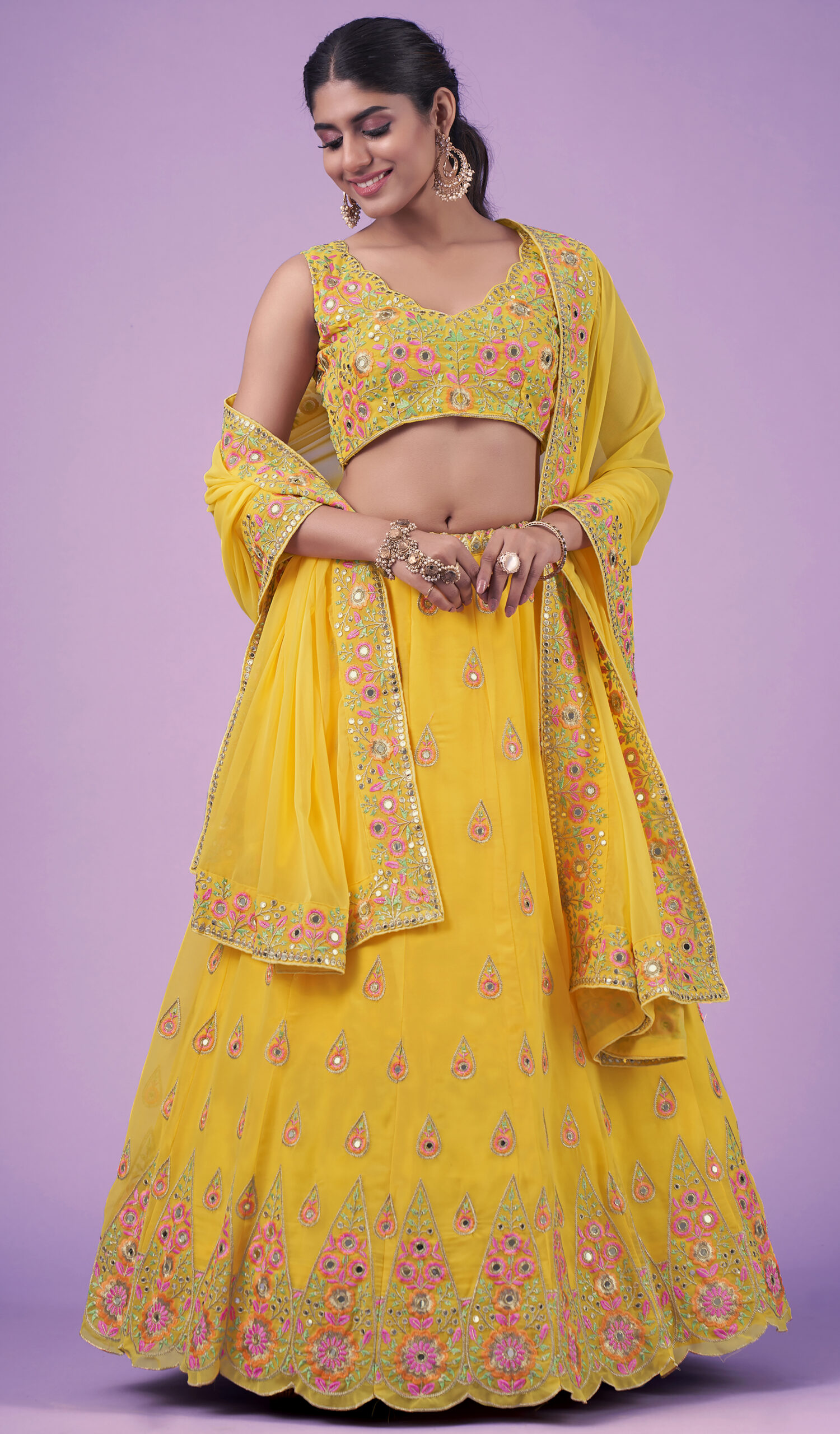 New Collection Yellow Lehenga Choli For Women at Rs.1450/Piece in shivpuri  offer by Odhni Nx