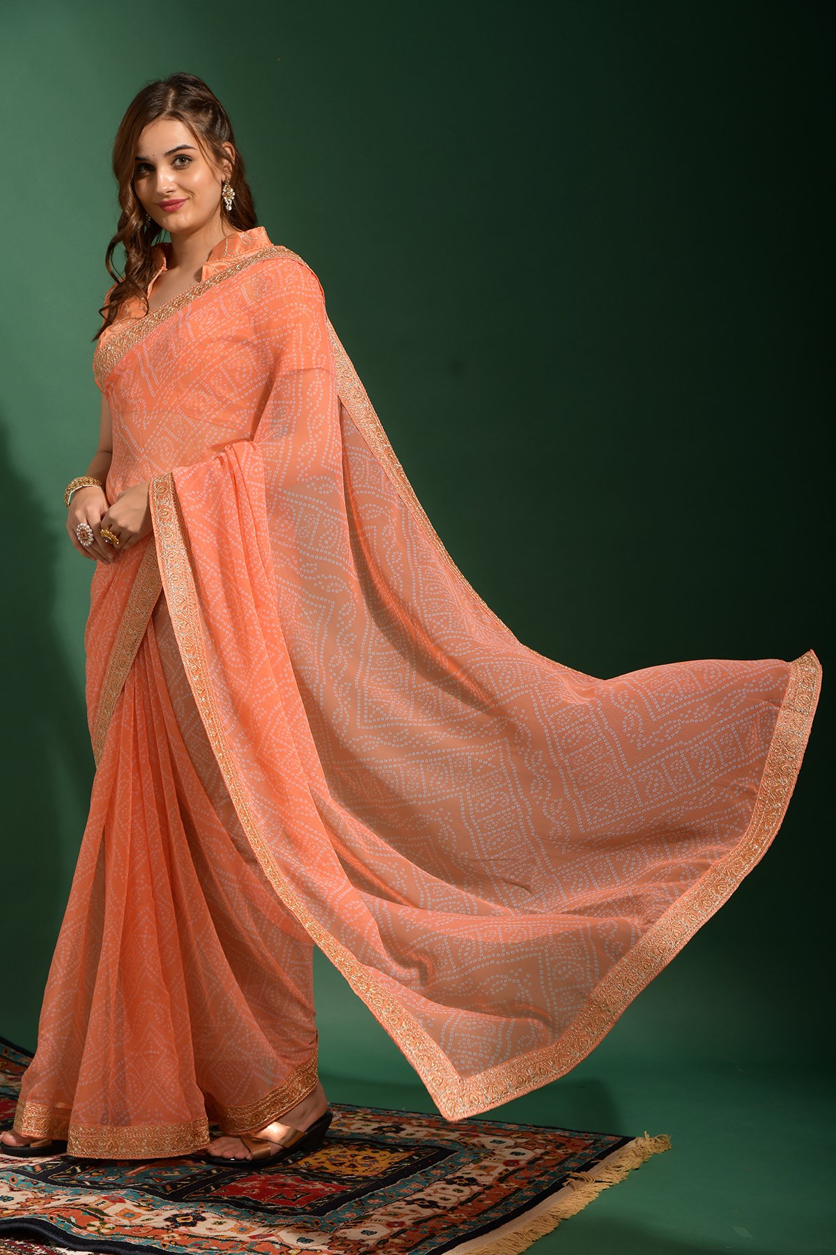 Latest Georgette Saree Peach Colour Lace Border