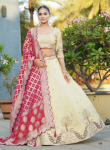off-white lehenga with red dupatta for bride