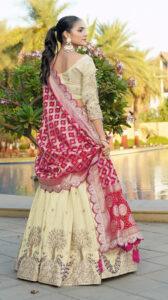 white bridal lehenga with red dupatta